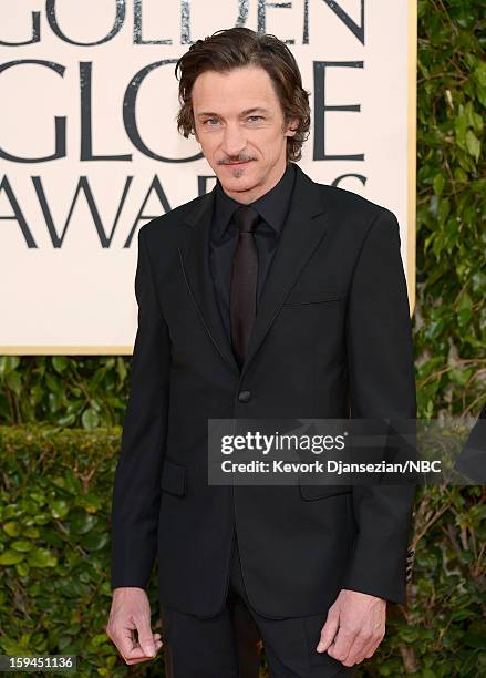 70th ANNUAL GOLDEN GLOBE AWARDS -- Pictured: John Hawkes arrives to the 70th Annual Golden Globe Awards held at the Beverly Hilton Hotel on January...