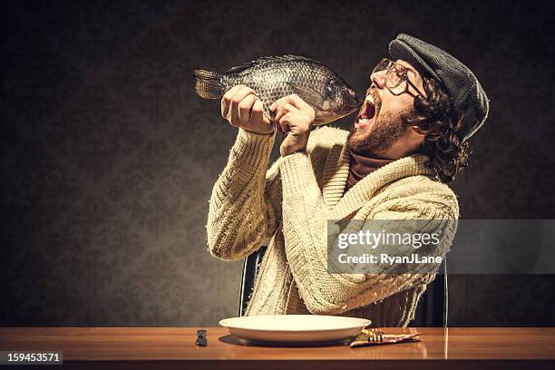 fish dinner - grotesque stock pictures, royalty-free photos & images