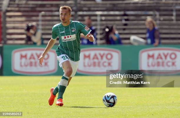 Morten Ruediger of Luebeck runs with the ball during the 3. Liga match between VfB Luebeck and SV Sandhausen at Stadion an der Lohmuehle on August...