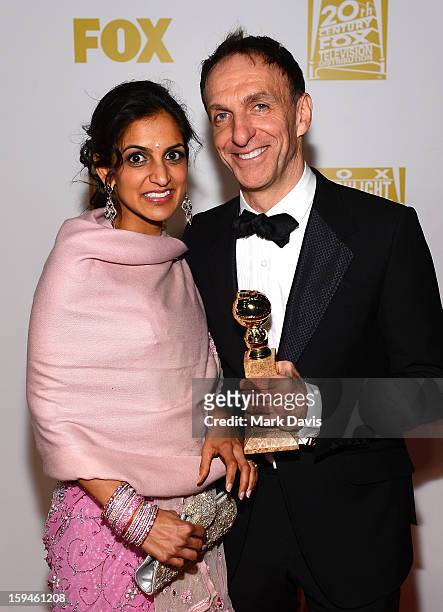 Composer Mychael Danna and Aparna Danna arrive at the FOX After Party for the 70th Annual Golden Globe Awards held at The FOX Pavillion at The...