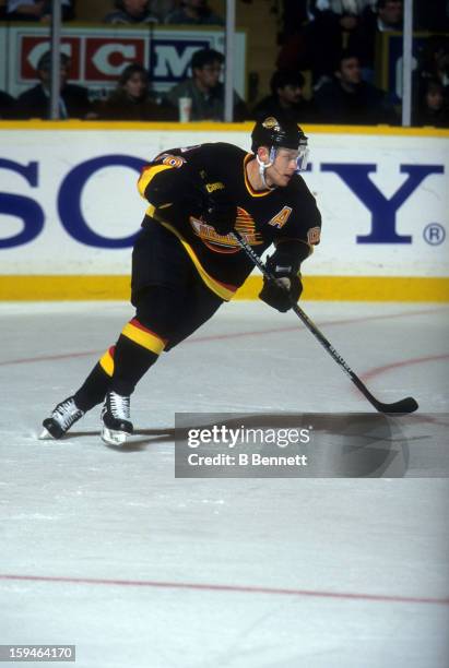 Pavel Bure of the Vancouver Canucks skates on the ice during an NHL game against the Toronto Maple Leafs on November 26, 1996 at the Maple Leaf...