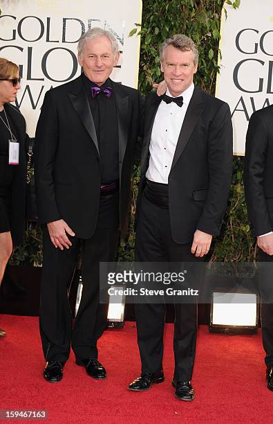 Actors Victor Garber and Tate Donovan arrive at the 70th Annual Golden Globe Awards held at The Beverly Hilton Hotel on January 13, 2013 in Beverly...