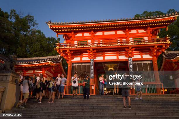 Tourists visit Yasaka shrine in Kyoto, Japan, on Friday, Aug. 11, 2023. Japan is scheduled to release its second-quarter gross domestic product...