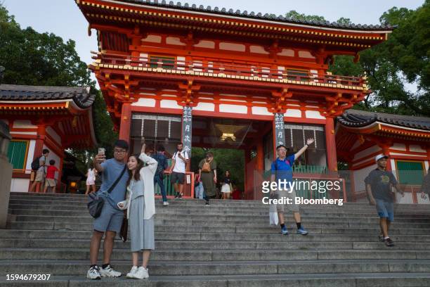 Tourists visit Yasaka shrine in Kyoto, Japan, on Friday, Aug. 11, 2023. Japan is scheduled to release its second-quarter gross domestic product...