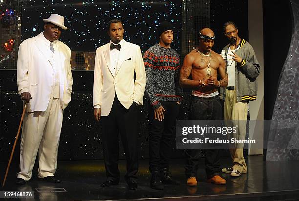 Chip attends a photocall to unveil wax figures of rap stars Biggie Smalls , P Diddy , Tupac Shakur and Snoop Dogg , exhibited for the first time...
