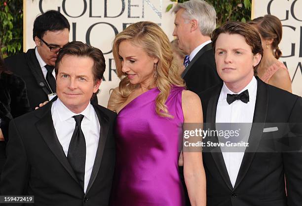 Actor Michael J. Fox, wife Tracy Pollan and son Mr. Golden Globe Sam Fox arrive at the 70th Annual Golden Globe Awards held at The Beverly Hilton...