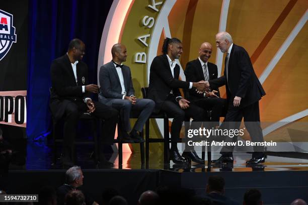 Gregg Popovich thanks Tim Duncan, Manu Ginobili, Tony Parker and David Robinson as part of the 2023 Basketball Hall of Fame Enshrinement Ceremony on...