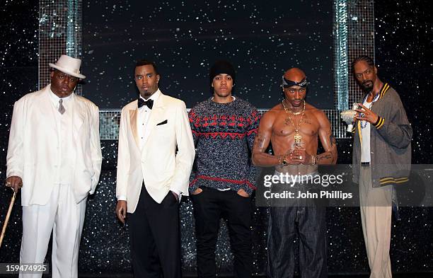 Chip attends a photocall to launch the wax figures of rap stars Biggie Smalls , P Diddy , Tupac Shakur and Snoop Dogg exhibited together for the...