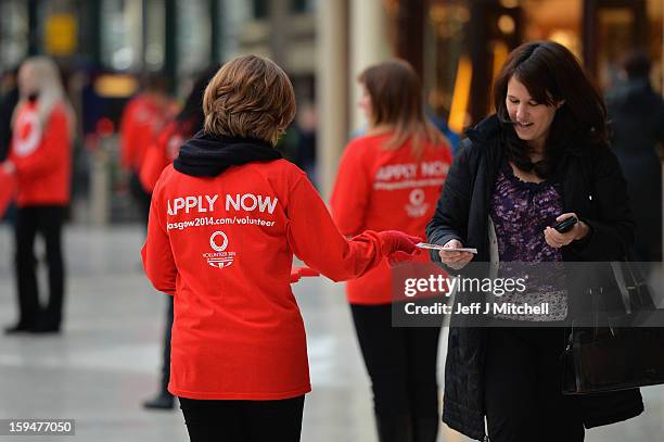 Staff from Glasgow 2014 help with the opening of volunteer applications on January 14, 2013 in Glasgow,Scotland. Up to 15,000 people will be needed...