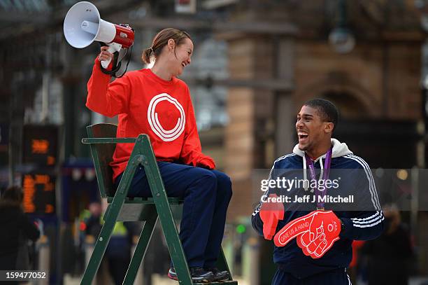 Olympic boxing gold medalist Anthony Joshua and badminton player Susan Egelstaff launch the opening of Glasgow 2014 volunteer applications on January...