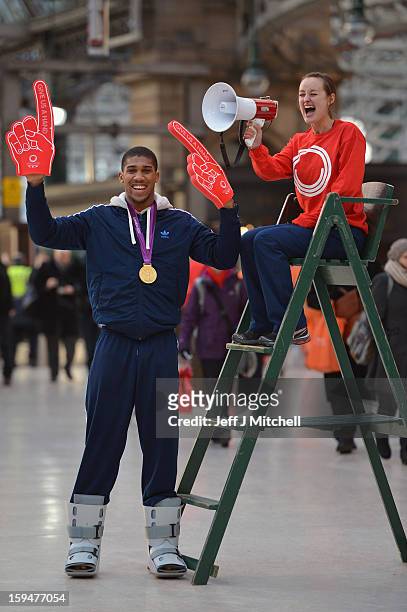 Olympic boxing gold medalist Anthony Joshua and badminton player Susan Egelstaff launch the opening of Glasgow 2014 volunteer applications on January...