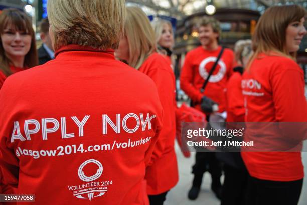 Staff from Glasgow 2014 help with the opening of volunteer applications on January 14, 2013 in Glasgow,Scotland.Up to 15,000 people will be needed to...