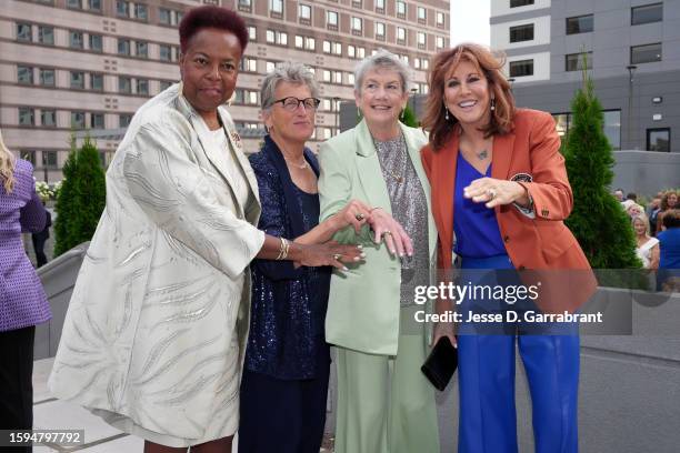 Gail Marquis, Juliene Brazinski Simpson, Mary Anne O'Connor and Nancy Lieberman pose for portrait during the 2023 Basketball Hall of Fame...