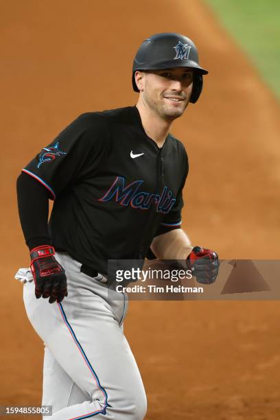 Nick Fortes of the Miami Marlins rounds the bases after hitting a home run against the Texas Rangers in the sixth inning at Globe Life Field on...