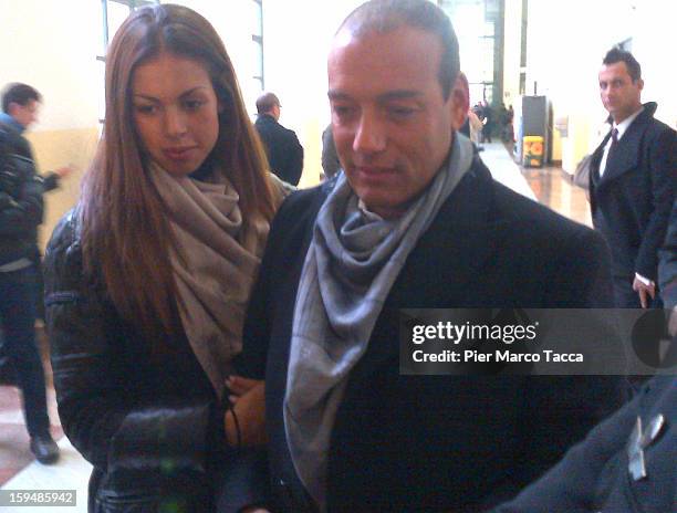 Karima El Mahroug arrives with Sergio Corsaro to testify at Silvio Berlusconi trial on January 14, 2013 in Milan, Italy. The Moroccan dancer is the...