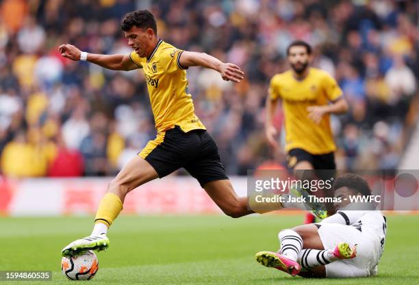 Matheus Nunes of Wolverhampton Wanderers runs with the ball under pressure during the pre-season friendly match between Wolverhampton Wanderers and...