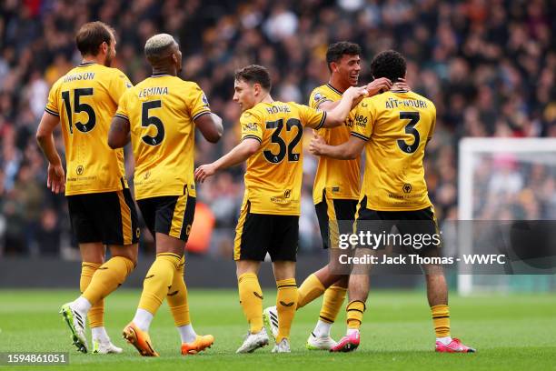 Rayan Ait-Nouri of Wolverhampton Wanderers celebrates with teammates after scoring his team's first goal during the pre-season friendly match between...