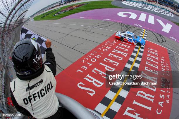 John Hunter Nemechek, driver of the Mobil 1 Toyota, takes the checkered flag to win the NASCAR Xfinity Series Cabo Wabo 250 and Joe Gibbs Racing's...