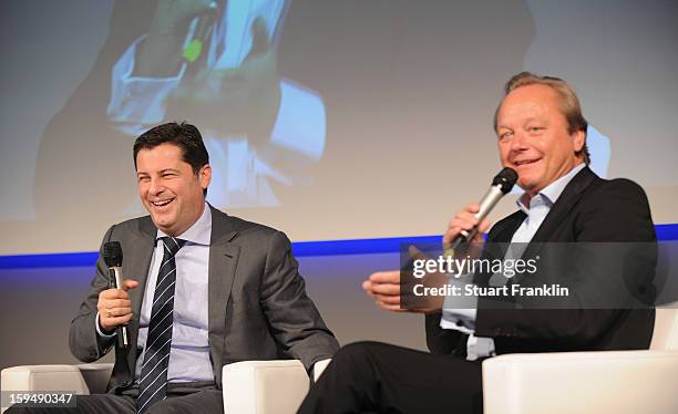 Christian Seifert, chairman of business for the DFL and Hanjo Schneider, CEO of Hermes europe at the announcement of Hermes as the new DFL premium...