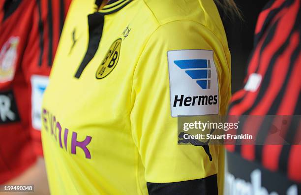 The Hermes badge on a football shirt during the press conference to announce Hermes as the new DFL premium sponsor on January 14, 2013 in Hamburg,...