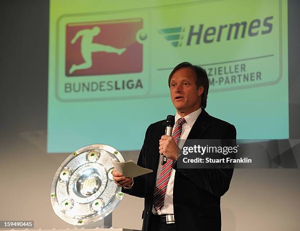 Television football pundit Gerhard Delling talks during the press conference to announce Hermes as the new DFL premium sponsor on January 14, 2013 in...