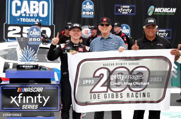 John Hunter Nemechek, driver of the Mobil 1 Toyota, JGR team owner and Hall of Famer, Joe Gibbs and Steve deSouza EVP NASCAR Xfinity...