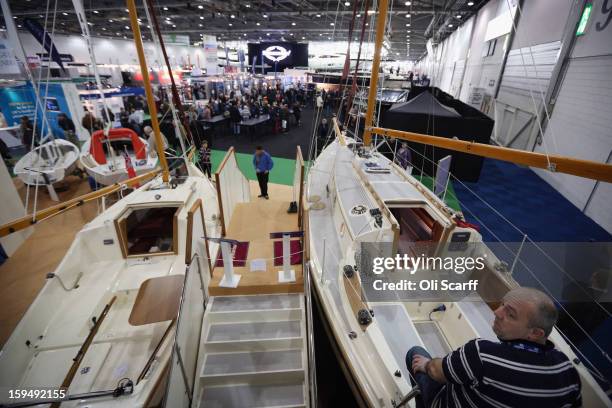 Visitors admire the boats on display at the 2013 London Boat Show, held at the ExCeL Centre, on January 14, 2013 in London, England. Until January...