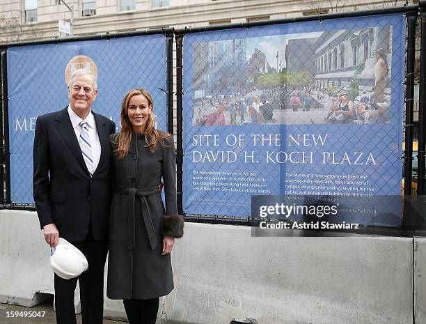 Philanthropist David H. Koch and wife Julia Koch stand in the future site of the new David H. Koch Plaza during the Fifth Avenue Plaza Groundbreaking...