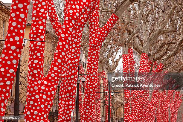 Ascension of Polka dots on trees" by the Japanese artist Yayoi Kusama are seen during the contempory art exhibition for Marseille-Provence 2013...