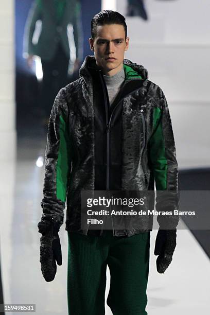 Model walks the runway during Dirk Bikkembergs show as a part of Milan Fashion Week Menswear Autumn/Winter 2013 on January 14, 2013 in Milan, Italy.