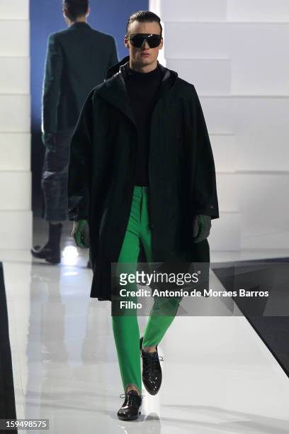 Model walks the runway during Dirk Bikkembergs show as a part of Milan Fashion Week Menswear Autumn/Winter 2013 on January 14, 2013 in Milan, Italy.