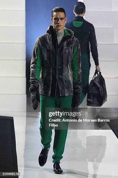 Model walks the runway during Dirk Bikkembergs show as a part of Milan Fashion Week Menswear Autumn/Winter 2013 on January 14, 2013 in Milan, Italy.