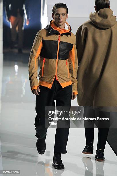 Model walks the runway during Dirk Bikkembergs show as a part of Milan Fashion Week Menswear Autumn/Winter 2013 on January 14, 2013 in Milan, Italy.