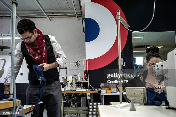 Employees of the new lingerie company "Les Atelieres" work in Villeurbanne, centraleastern France, on January 14, 2013. "Les Atelieres" was founded...