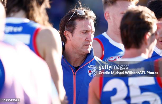 Luke Beveridge, Senior Coach of the Bulldogs addresses his players during the 2023 AFL Round 22 match between the Hawthorn Hawks and the Western...