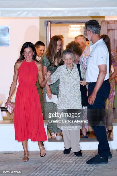 Queen Letizia of Spain, Crown Princess Leonor of Spain, Princess Irene of Greece and King Felipe VI of Spain leave the Mia restaurant on August 5,...