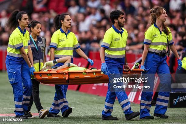 Goalkeeper Geronimo Rulli of Ajax leaves the pitch injured on a stretcher during the Dutch Eredivisie match between Ajax and Heracles Almelo at Johan...