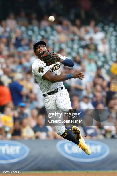 Andruw Monasterio of the Milwaukee Brewers throws out a runner in the fourth inning against the Pittsburgh Pirates at American Family Field on August...