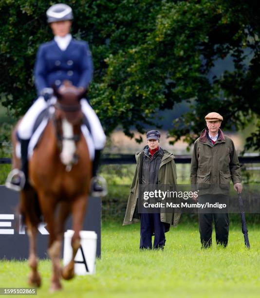 Princess Anne, Princess Royal and Vice Admiral Sir Timothy Laurence watch Zara Tindall compete, on her horse 'Class Affair', in the dressage phase of...