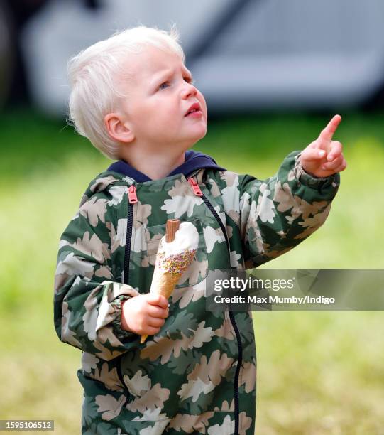 Lucas Tindall seen eating an ice cream as he attends day 2 of the 2023 Festival of British Eventing at Gatcombe Park on August 5, 2023 in Stroud,...