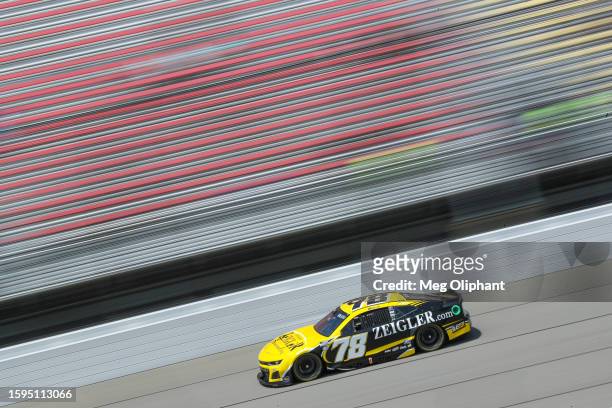 Josh Bilicki, driver of the Zeigler Auto Group Chevrolet, drives during practice for the NASCAR Cup Series FireKeepers Casino 400 at Michigan...