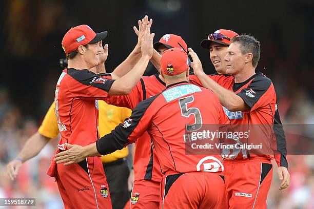 Darren Pattinson of the Renegades is congratulated by teammates after taking the first wicket during the Big Bash League Semi-Final match between the...