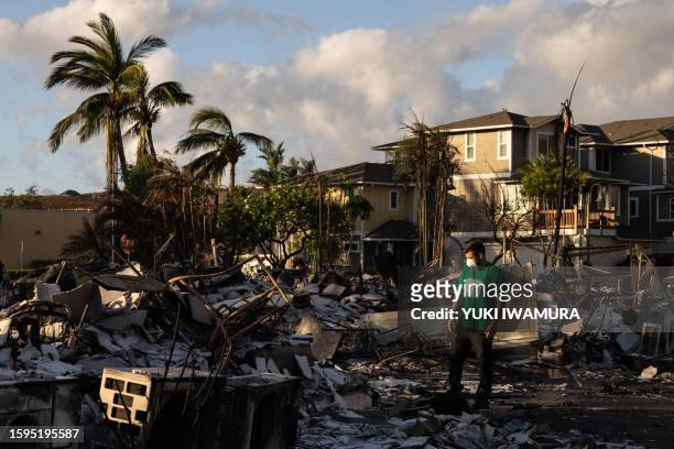 Mercy Worldwide volunteer makes damage assessment of charred apartment complex in the aftermath of a wildfire in Lahaina, western Maui, Hawaii on...