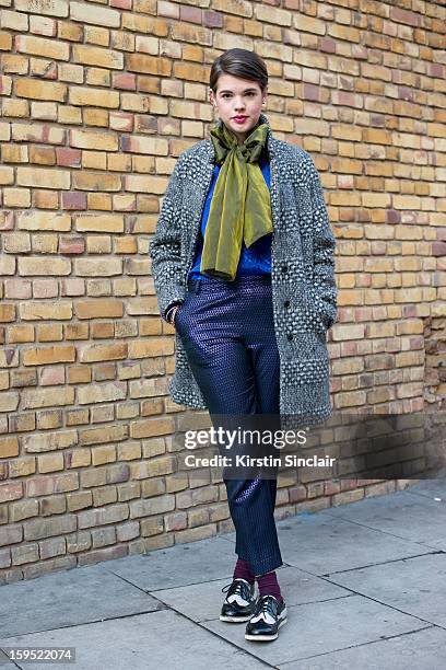 Jo Lees social media manager for Finlay and Co wearing H and M kids shoes, H and M trousers and jacket, vintage scarf and top and an Asos Ear cuff on...