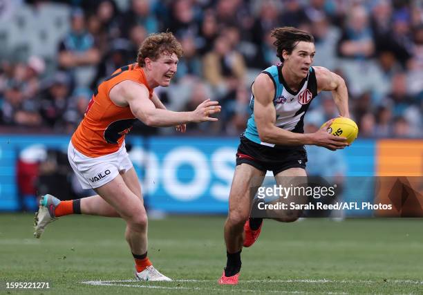 Connor Rozee of the Power and Tom Green of the Giants during the 2023 AFL Round 22 match between the Port Adelaide Power and the GWS GIANTS at...