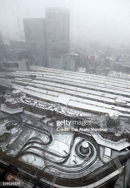 Snow covered Tokyo Station is seen on January 14, 2013 in Tokyo, Japan. A strong low pressure system caused heavy snow and strong wind in the coast...