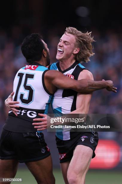 Willie Rioli and Miles Bergman of the Power celebrate a goal during the 2023 AFL Round 22 match between the Port Adelaide Power and the GWS GIANTS at...