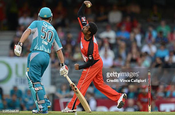 Muttiah Muralitharan of the Renegades bowling during the Big Bash League Semi-Final match between the Melbourne Renegades and the Brisbane Heat at...