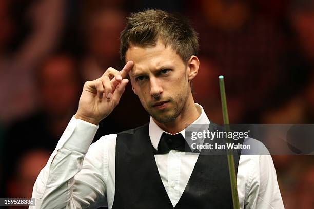 Judd Trump of England looks on during his first round match against Barry Hawkins of England at Alexandra Palace on January 15, 2013 in London,...