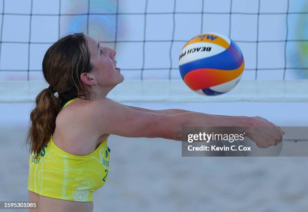 Cameron Zajer of Team Australia plays a shot with partner Jasmine Rayner of Team Australia against Alice Jagielska of Team England and partner Daisy...